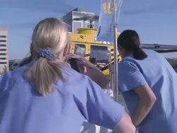 Nurses taking patient to helicopter to the hospital  Stock Footage