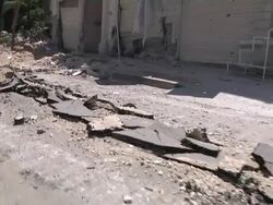 Tank damaged road in Gaza News Clip