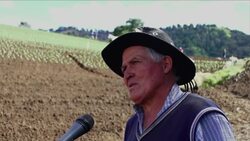 Farmers create terraces alongside volcano in attempt to stop heavy rains eroding their crops News Clip