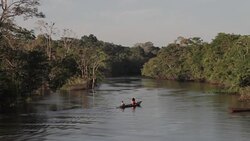 Villagers aboard river skiffs, Peruvian Amazon, Peru Stock Footage