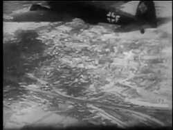 B/W 1940 AERIAL Nazi airplane flying over landscape / He 111 / London Blitz / educational Stock Footage