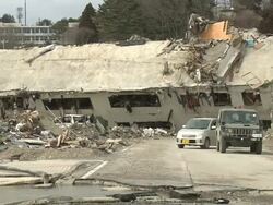 Destruction in Onagawa city, near Sendai Japan on 3rd April 2011; after tsunami following Tohuku earthquake of March 2011. Stock Footage