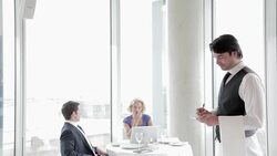 Portrait of waiter taking order in restaurant Stock Footage