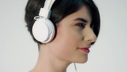 Woman listening to music Stock Footage
