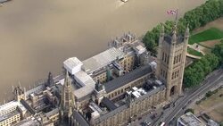 Aerials of Parliament with roof repairs underway News Clip