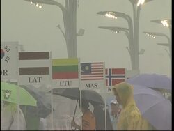 Heavy rain delays races, dampens crowds News Clip