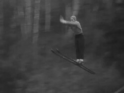 Fake snow ensures bad weather doesn't interrupt ski jump competition Stock Footage