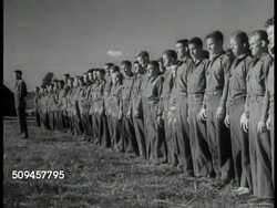1933: U.S. CIVILIAN CONSERVATION CORPS: XWS CCC Camp, recruits arriving on truck. WS CCC men lined up for inspection. MS CCC men standing in line. New Deal Instructional Video