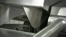 Machinery operates in a sausage making plant. Stock Footage