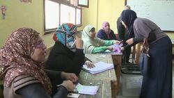 CLEAN : Polls open in Egypt constitution vote News Clip