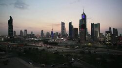 Arabian Peninsula, Kuwait, Kuwait City, Elevated day to night transition over the city centre Stock Footage