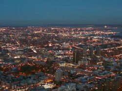 Aerial looking out at upper East side, Harlem, Queens and the Brink at night, NYC Stock Footage