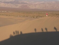 HD: Hiking over sand dunes Stock Footage