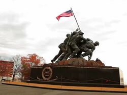 A panning down shot of the Marine Corps War Memorial and its ground on a breezy day at morning. Stock Footage