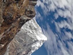 Vertical shot of Time-lapse of clouds passing over rocky Himalayan peaks. Stock Footage