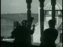1938: ROOSEVELT ESTATE: Silhouette of African American women cleaning porch posts. XWS FDR's estate & home across Hudson River. EXT Front of Franklin D. Roosevelt's home. LS Sara Delano Roosevelt (mother of FDR) w/ flower basket in garden. Instructional Video