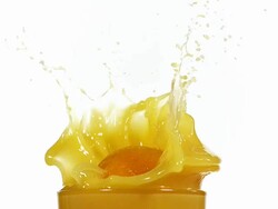 MS SLO MO Orange being Fallen into glass of orange / Vieux Pont, Normandy,  France Stock Footage