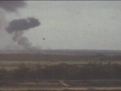 Amateur Vietnam Marine Footage of US Airplanes diving and bombing, explosions, plumes of smoke and plane flying overhead. Stock Footage