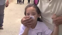 CLEAN : Venezuelan clashes force school to evacuate and flee tear gas News Clip