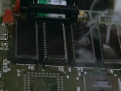 Circuit Boards - CU burns out; orange and white sparks, grey smoke, hole burnt in board Stock Footage