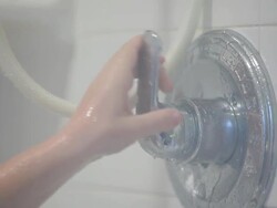 Turning off the Shower Stock Footage