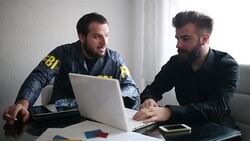 Fbi agent and businessman talking Stock Footage