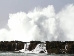 WS Waves crashing shore on lava rocks   / Haleiwa, Hawaii, United States Stock Footage