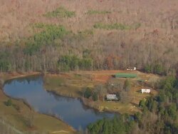 MS AERIAL Shot of lake and house / North Carolina, United States Stock Footage