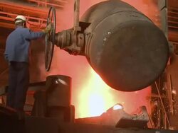  WS Inductive heating furnace at foundry / Juenkerath, Rhineland-Palatinate, Germany  Stock Footage