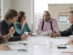  MS PAN Businessman leading meeting at conference table / New York, USA Stock Footage