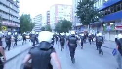 Clashes erupt between demonstrators and riot police News Clip