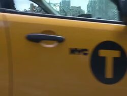 Black Lincoln Towns Car On a Busy City Street Stock Footage