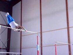 HD:Shot of Male Gymnast Performing Routine on Horizontal Ba Stock Footage