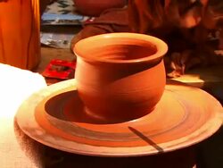 Hands making pottery on a Wheel Stock Footage