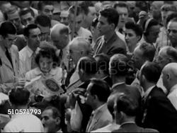 1948: DEMOCRATIC NATIONAL CONVENTION: DIXIECRATS WALK-OUT: Same male Delegate from Alabama standing w/ others saying Mississippi also disagrees w/ platform & will join them...'we bid you good-bye.' Delegates leaving, others waving fans. States Rights Instructional Video