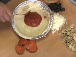 making a small pizza Stock Footage