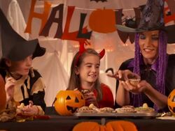 HD DOLLY: Elementary Students Baking Halloween Pastries Stock Footage