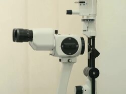 Senior man has his eyesight examined Stock Footage