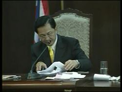 Thai court disbands Thaksin's political party, Thaksin s'bite News Clip