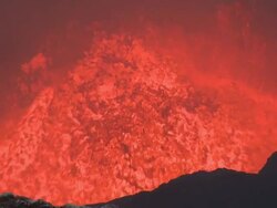 Lava lake explodes vigorously from large crater, Marum Volcano, Ambrym Island, Vanuatu Stock Footage