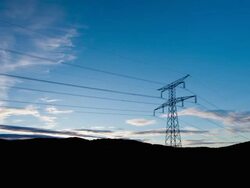 Time lapse of electrical lines and pylon at sunset Stock Footage