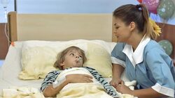 HD DOLLY: Pediatric Nurse Taking An Oral Temperature Stock Footage