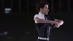 SLO MO LD Young male figure skater spinning Stock Footage