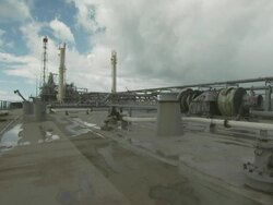 Deck of oil production platform and flame boom, Australia Stock Footage