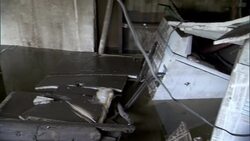 Appliances and other debris float in a flooded basement. Stock Footage