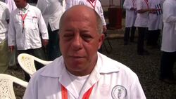 Cuban doctors sent to help fight spread of Ebola attend ceremony at clinic News Clip