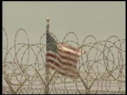 The Pentagon charges six Guantanamo Bay detainees for the September 11th terrorist attacks. They will be tried together before a military tribunal. Under the military justice system, the half-dozen suspects may face the death penalty. News Clip