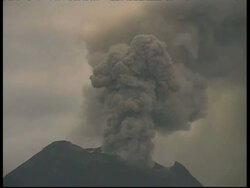 MS grey smoke and ash cloud billow from crater into sky, Mount Tunguragua, Ecuador Stock Footage