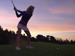 A woman playing golf. - Super Slow Motion - filmed at 240 fps Stock Footage