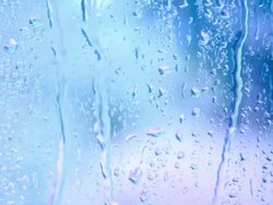 Window with Raindrops over Blue Stock Footage